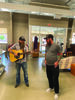 Whey Jennings and guitarist Nathan surprised shoppers at the Quincy Salvation Army Store with a song.