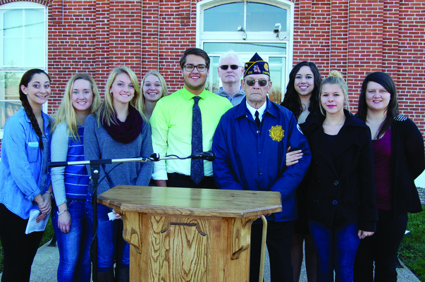 The Highland History Club has been honoring veterans with a special program for twenty years  held at the Lewis County Courthouse.  Members of the club are pictured with guest speaker Richard Pace, who is the current commander of Otto Bruner Post 170. Mr. Pace rode the lead horse pulling the caisson during President Kennedy's funeral in November 1963.