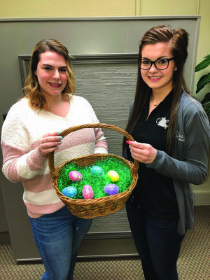 Peyton Welter and Kayla Merrell are ready for Easter at Canton State Bank The bank lobby is closed at this time to walk-in customers. Appointments are available and the drive-up is open.