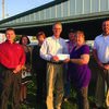 The Community Foundation presented a grant to the Lewis County Fair for improvements to the beef barn. Pictured are: Luke Rothweiler, Keli Geisendorfer, Jill Arnold Blickhan, Virgil Welker, David Plant, Jill Putman, and Jake Brewer.