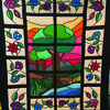Stain Glass quilt, a blue ribbon winner and best of show at the 1985 Lewis County Fair, created by Inez Gregory.