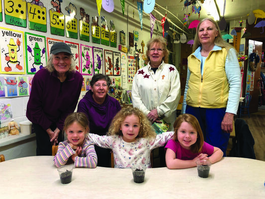 Garden Club members Linda Hess, SueAnn Gaus, teacher Carolyn Feldkamp and Suzanne McGee with children Kaylee, Emery and Ella.
