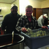The next Lions Club fish fry in LaGrange will be held March 18 with serving from 4:30 to 7 p.m. The event is very popular  and a large crowd usually attends. Pictured at the fish fry held March 3 are Lions Club members  Jimmy Dade and PJ Logsdon