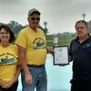 Jerry Lincoln, MFA Bulk Plant Manager presenting a $2,000 check to John Whitaker, Board Member of the Splash Station and Karla Richmond, Grant Writer for Splash Station.