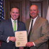 Missouri House Speaker Elijah Haahr presents the Legislator of the Year award to State Representative Greg Sharpe