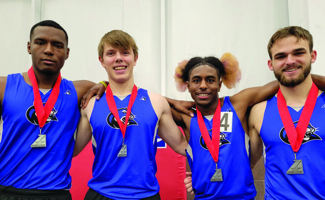 4x400 relay team with second place medals - Verlyn Johnson, Drew Mallett, Anthony Havens, Jr., and Sean Cleary.
