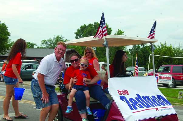 Rep. Craig Redmon likes to be in the local parades and visit with friends and neighbors.