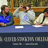 Braeden Wenneker, center, puts on sunglasses given to him by Ryan Christian, director of the Pride of Culver-Stockton College Marching Band, on Friday morning at Highland High School in Ewing, Mo. At right is Wenneker's mother, Tammy Wenneker.