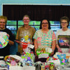 Youth center volunteers who were helping with the LaGrange Youth Center Quarter Madness fundraiser included (l-r) Director Betty Bronestine, Sharon Sherwood, Suellen Robinson and Cheryl Lowe.
