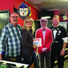 Ralph Martin, Karen McFarland and Craig Redmon stand by a cardboard cutout of Redmon. Craig was celebrating his birthday at his bowling tournament.