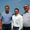U.S. Rep. Graves poses for photo at top of Lock and Dam 20 with IDA director Ralph Martin and lockmaster Jim McDaniel.