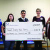 The Lewis County Food Pantry received a donation from the Quincy Medical Group and QMG  Healthcare foundation. Pictured are (l-r): Eva Bracey (Quincy Medical Group), Pastor Mandy Gosik (Lewis County Food Pantry), Dr. Arvin Abueg (Quincy Medical Group), Sara Reuschel (QMG Healthcare Foundation), and Danielle Casey (Quincy Medical Group).