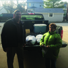 Richard Horner oversees the Share The Harvest Program in Lewis County. He is pictured with Nina Porter of the Canton Food Pantry.